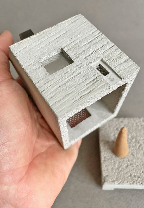This concrete HOUSE object is an incense burner made of mortar. High Tea with Mrs Woo presents Pull+Push, made by Nobuhiro Sato and his small team in Kyoto, Japan. Crafted Object. Incense Holder.